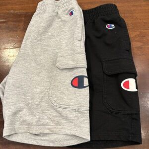 2 pairs of Champion shorts both Youth Medium